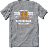 74 Jaar Legend T-Shirt | Goud - Wit | Grappig Verjaardag en Feest Cadeau Shirt | Dames - Heren - Unisex | Tshirt Kleding Kado | - Donker Grijs - Gemaleerd - 3XL