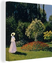 Canvas Schilderij Vrouw in een tuin - Schilderij van Claude Monet - 50x50 cm - Wanddecoratie