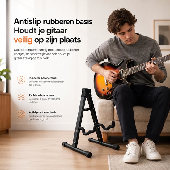 Man speelt op een elektrische gitaar terwijl deze op een zwarte A-frame gitaarstandaard staat met antislip rubberen basis.