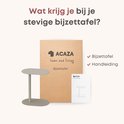 De ACAZA bijzettafel en handleiding verpakt in karton.
