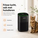 Zwarte luchtreiniger naast een zittende Bengaalse kat, met tekst "Frisse lucht, ook met huisdieren".