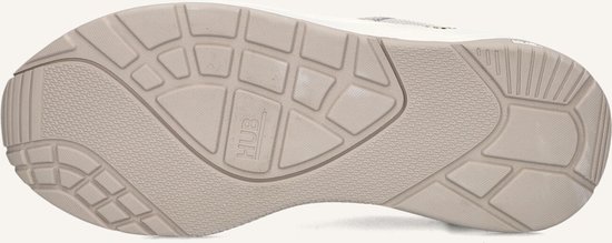 Beige buitenzool van een HUB sneaker met een gestructureerd profiel.