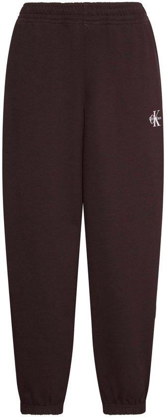Bruine joggingbroek met elastische tailleband en witte Calvin Klein Jeans logo op de linker heup.