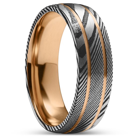 Zilverkleurige ring met roségouden details, damascuspatroon en gouden binnenkant.