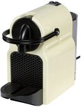 Vue en biais d'une machine à café à capsules Nespresso Inissia crème.