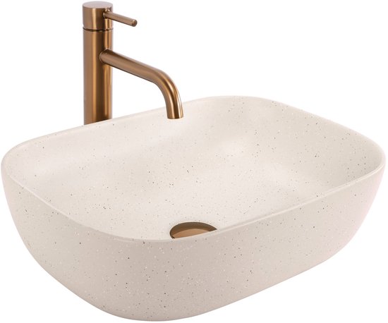 Crèmekleurige, rechthoekige waskom met beige spikkels en bronzen kraan.
