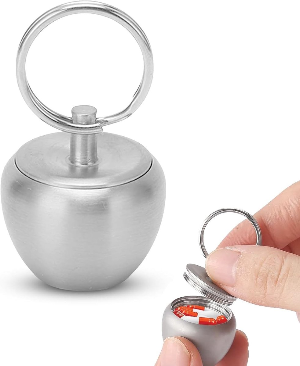 Klein Appelvormig Pillendoosje van Roestvrij Staal, Draagbare Medicijnbox met Sleutelhanger en Verzegeld Design voor Reizen en Organisatie