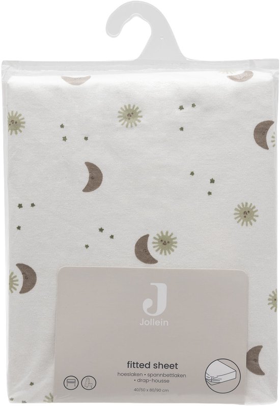 Verpakte wiegmolton van Jollein met een print van bruine manen en groene zonnetjes.
