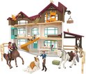 Schleich speelgoedhuis Lakeside Villa & Paddock met paarden, hond en figuren.
