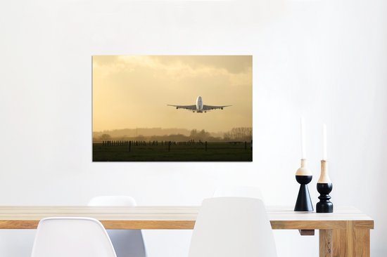 Un avion décollant d'un aéroport Aluminium 90x60 cm - Tirage photo sur aluminium (décoration murale métal)