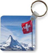 Sleutelhanger - Zwitserse Vlag bij Matterhorn in Zwitserland - Plastic - Rond - Uitdeelcadeautjes