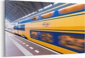 Schilderij - Snel rijdende trein in Amsterdam Centraal Station — 100x70 cm