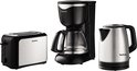 Une cafetière noire, un grille-pain argenté et une bouilloire argentée.