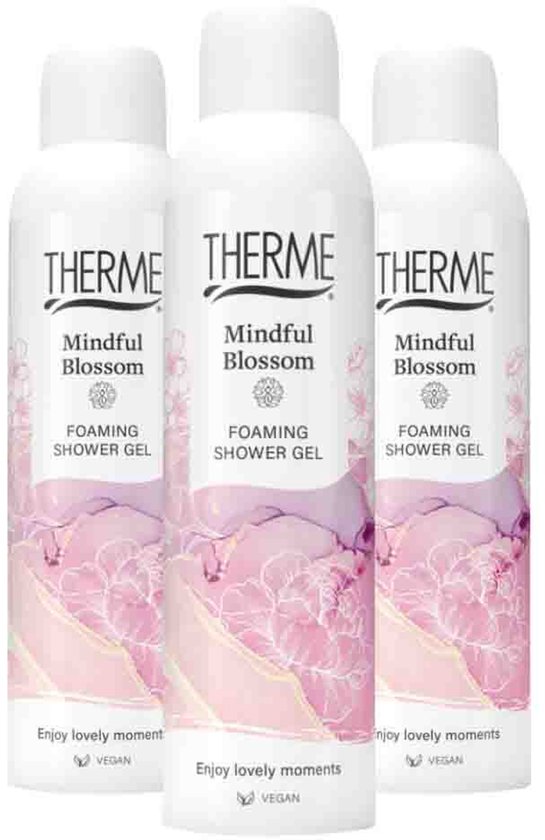 Drie flacons Therme Mindful Blossom schuimende douchegel met roze bloemmotieven en vegan label.