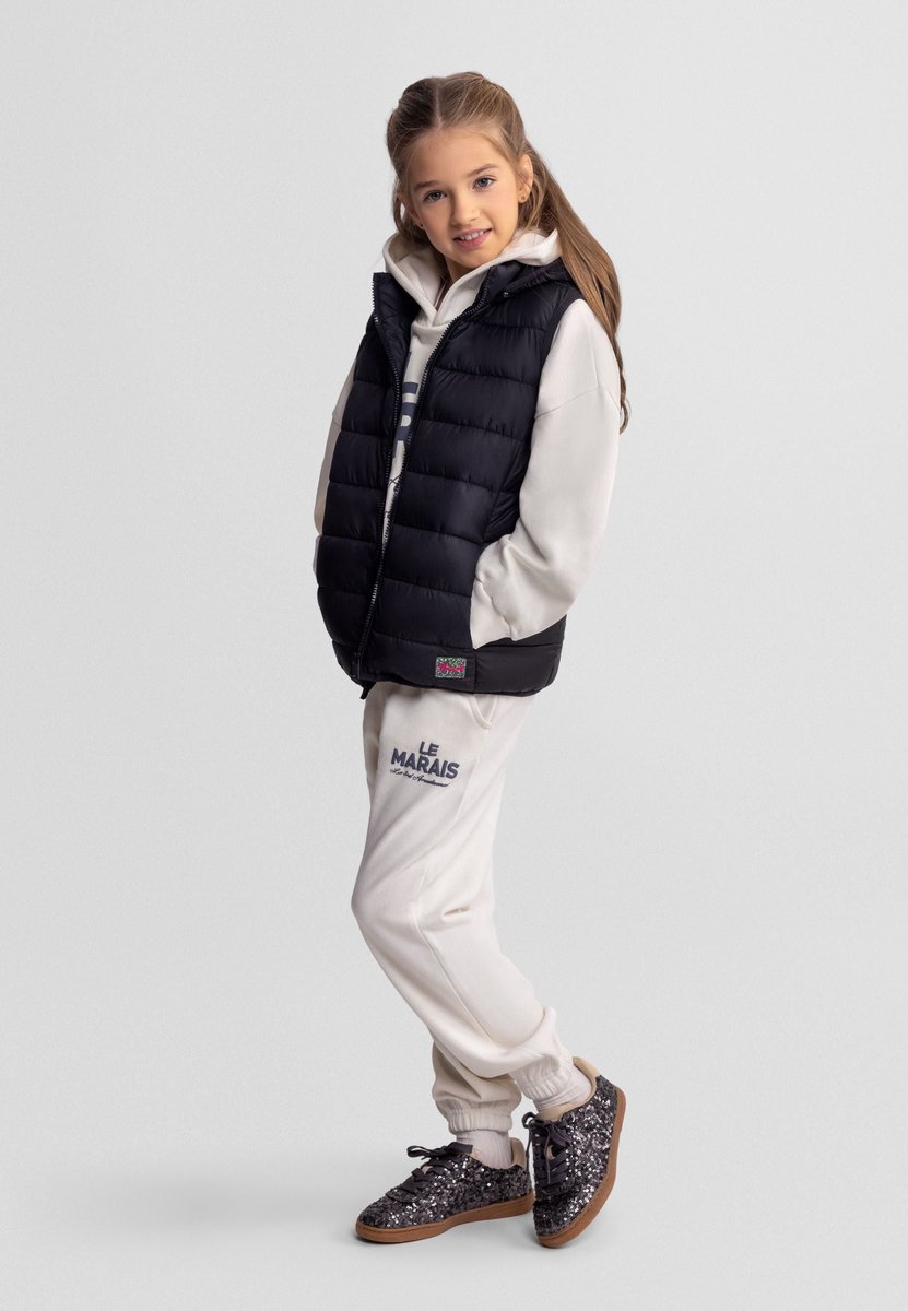 Minoti gewatteerde bodywarmer meisjes met afneembare capuchon Zwart