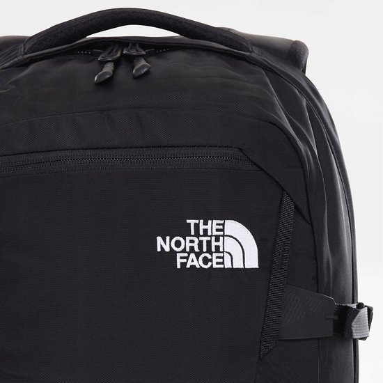 Zwarte rugzak van The North Face met wit logo op de voorkant.