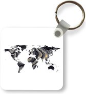 Sleutelhanger - Uitdeelcadeautjes - Wereldkaart - Goud - Zwart Wit - Plastic