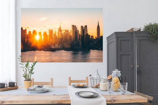 Poster Le lever du soleil sur les toits de Manhattan 180x120 cm - Tirage photo sur Poster (décoration murale salon / chambre) XXL / Groot format!