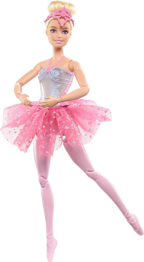 Barbie ballerina met blonde staart, roze tiara, roze tutu met sterren, blauw/zilveren korset en roze panty's in ballerina pose.