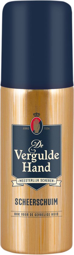 Gouden scheerschuimfles met blauwe dop. Het etiket heeft een blauw schild met het logo en "De Vergulde Hand".