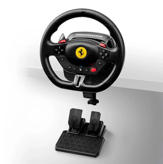 Zwarte race wheel met Ferrari-logo en pedalen, losse onderdelen.