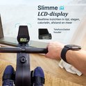 Roeitrainer met zwart LCD-scherm dat tijd, slagen, calorieën en afstand weergeeft. Telefoon-/tablethouder.