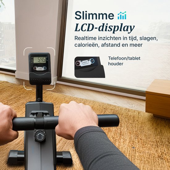 Close-up van een roeimachine LCD-display met telefoonhouder. Toont tijd, slagen, calorieën.