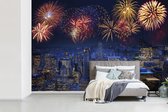 Behang - Fotobehang Vuurwerk boven New York - Breedte 420 cm x hoogte 280 cm