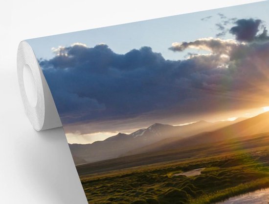 Behang - Fotobehang Zonsondergang boven een kalme rivier - Breedte 600 cm x hoogte 400 cm