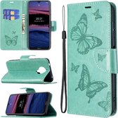 Mobigear Telefoonhoesje geschikt voor Nokia G20 Hoesje | Mobigear Butterfly Bookcase Portemonnee | Pasjeshouder voor 2 Pasjes | Telefoonhoesje voor Pinpas / OV Kaart / Rijbewijs - Turquoise