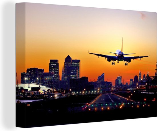 Canvas Schilderij Vliegtuig land in London - 30x20 cm - Wanddecoratie