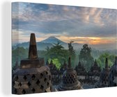 Canvas Schilderij Zonsopgang bij de tempel Borobudur in Indonesië - 120x80 cm - Wanddecoratie