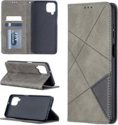Voor Samsung Galaxy A12 Prismatisch onzichtbaar magnetisch horizontaal flip lederen tas met houder & kaartsleuven en fotolijst (grijs)