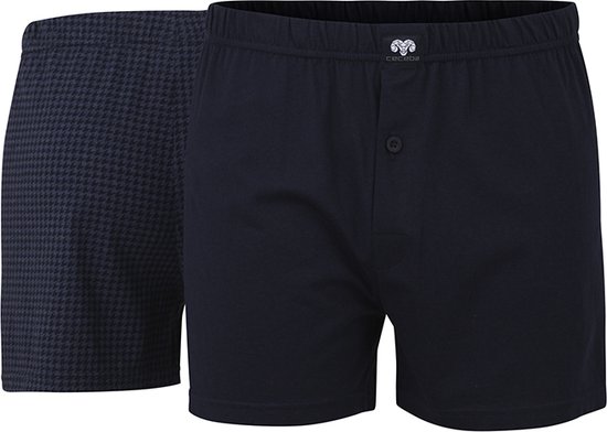 Twee Ceceba boxershorts: één met pied-de-poule patroon in blauw, één effen donkerblauw.