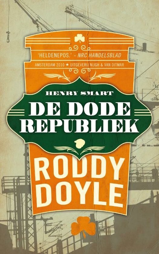Boek "De Dode Republiek" van Roddy Doyle, oranje en groen met achtergrond van kranen.