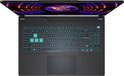 Bovenkant van de open zwarte MSI gaming laptop met verlicht, turquoise toetsenbord en trackpad.