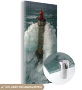 MuchoWow® Glasschilderij 80x160 cm - Schilderij acrylglas - De Franse Vuurtoren van la Jument in een krachtige storm - Foto op glas - Schilderijen