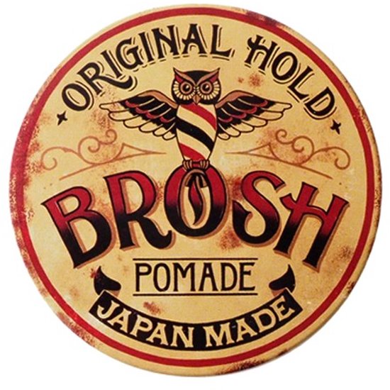 Ronde metalen blik met het Brosh logo: een uil met vleugels, "ORIGINAL HOLD BROSH POMADE JAPAN MADE".