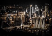 Fotobehang - Vlies Behang - Verlichte Wolkenkrabbers in de Stad in de Nacht - 312 x 219 cm