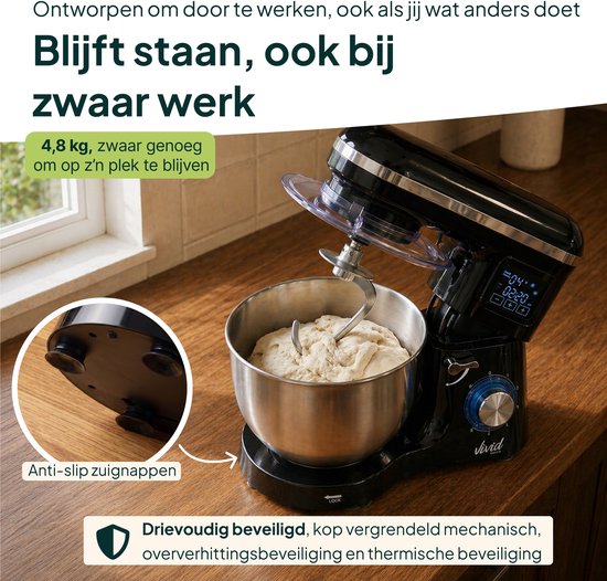 Zwarte keukenmixer met metalen kom, deeg, anti-slip zuignappen en informatie over beveiliging.