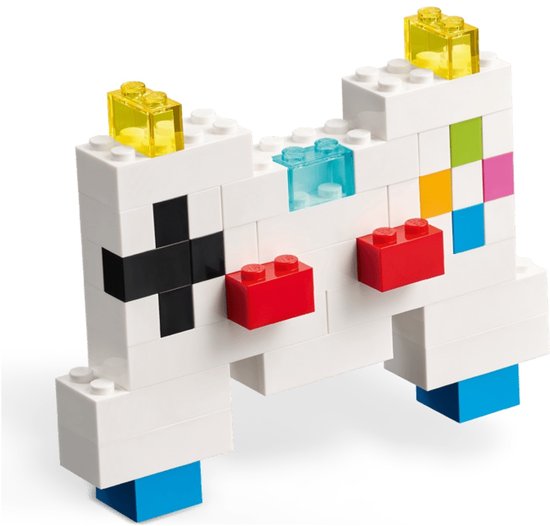 Een LEGO-versie van een spelcomputer, voornamelijk wit met rode, blauwe en gele accenten.