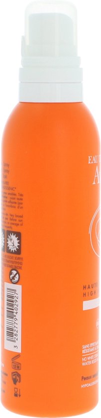 Zij-aanzicht van oranje Avène spuitfles met 'HAUTE PROTECTION HIGH PROTECTION' en SPF 30.