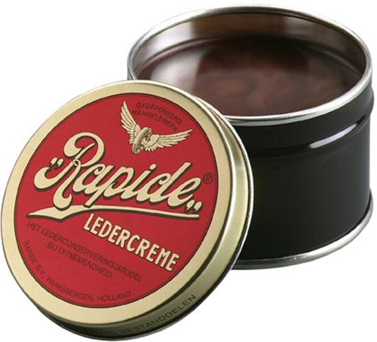 Rapide ledercreme in zwart blik met gouden deksel. Tekst: Rapide Ledercreme.