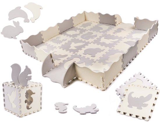 Grijze en crèmekleurige speelmat met dierenpuzzels en uitneembare vormen zoals konijnen en dolfijnen.