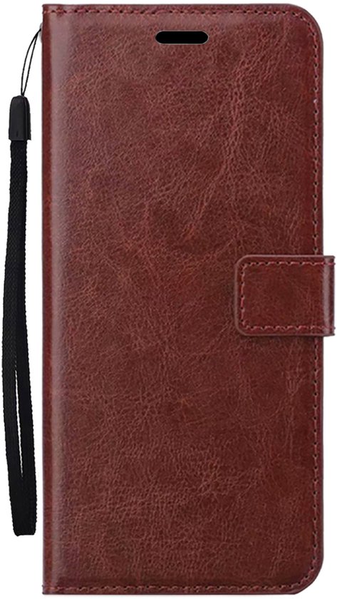 Étui portefeuille marron en cuir avec boucle et dragonne.