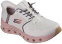 Zijanzicht van een witte Skechers Slip-Ins Glide-Step Pro instapper met roze zool en paarse accenten.