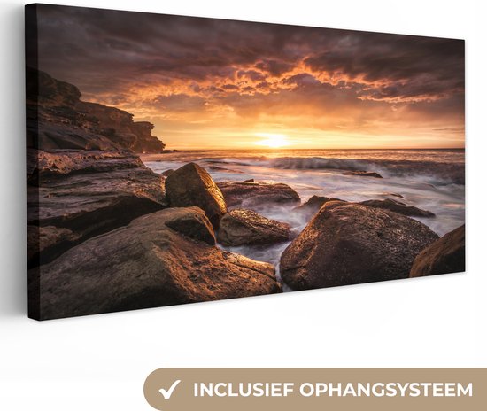 Canvas doek - Foto op canvas - Landschap - Zonsondergang - Zee - Rotsen - Wolken - 80x40 cm - Canvas doek