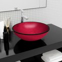 Lavabo rouge mat avec un bord noir.