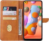 Smartphonica Samsung Galaxy A11 kunstleren hoesje met lipje en pashouders – Bruin / Kunstleer / Book Case geschikt voor Samsung Galaxy A11