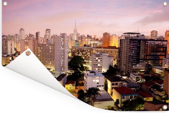 Tuinposters buiten Een roze getinte schemering valt over São Paulo in Brazilië - 90x60 cm - Tuindoek - Buitenposter
